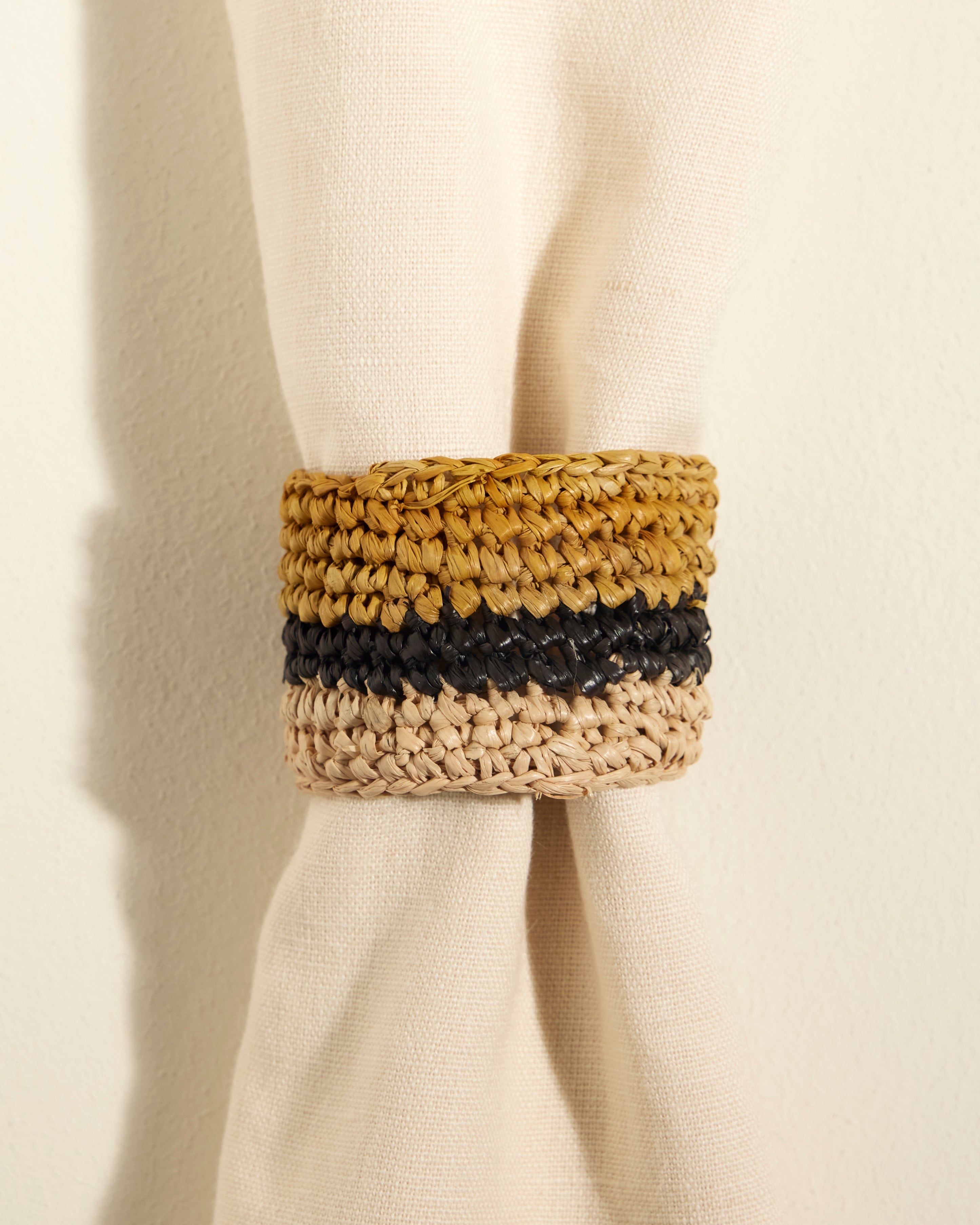 Napkin rings made of raffia