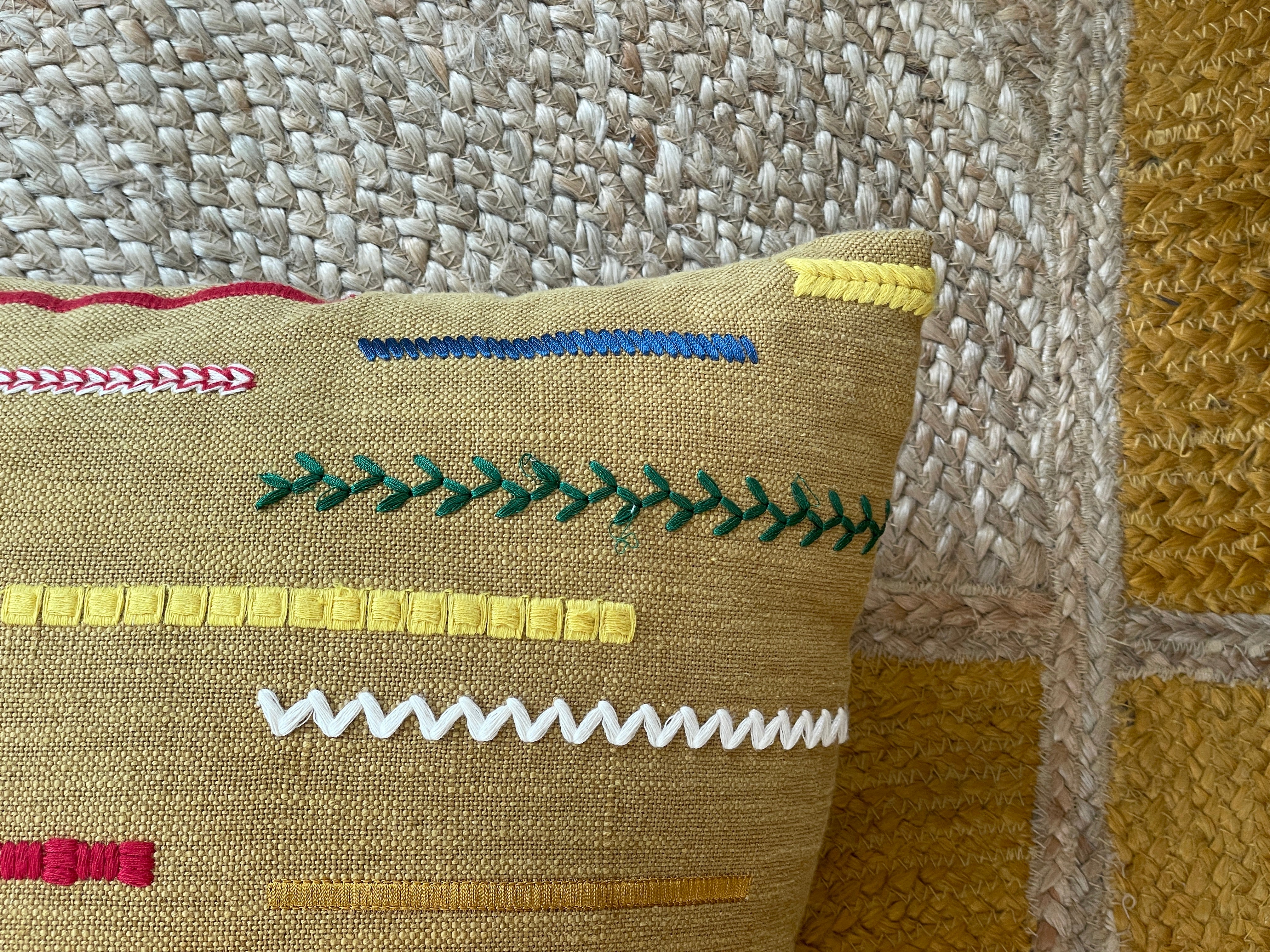 Embroidered cushion in ethnic style